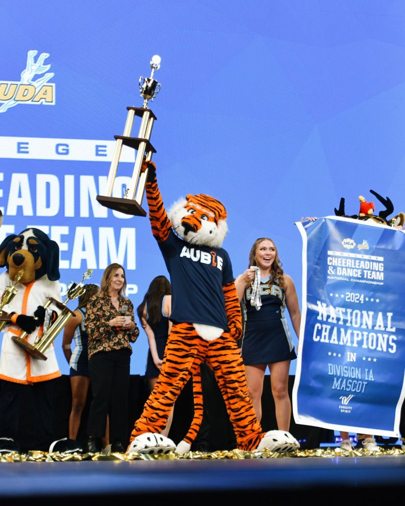 Aubie with his trophy after winning his 11th national title