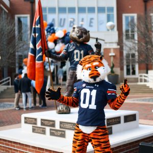 Aubie, Auburn University's mascot, posing with this new statue outside the Melton Student Center. 